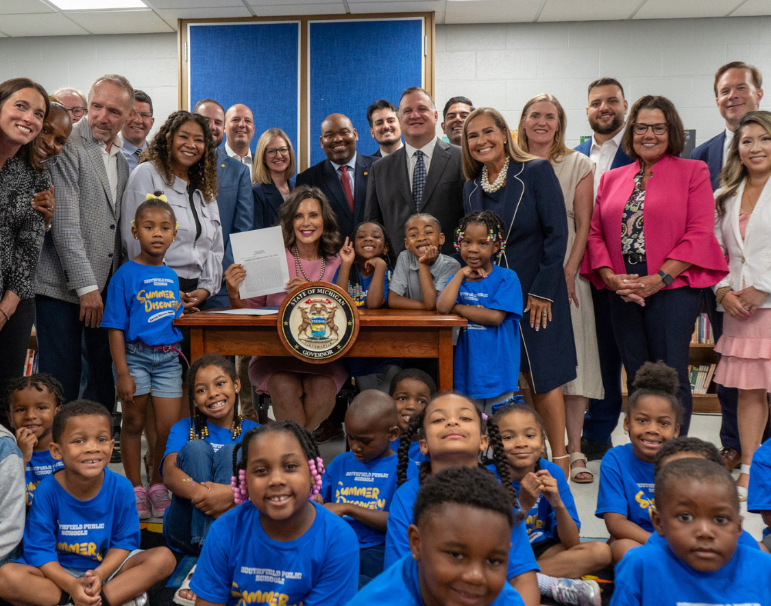 Gov. Whitmer signing the state budget